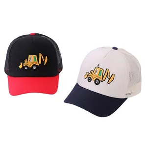 Detail of cartoon excavator embroidery on breathable mesh trucker hats for kids