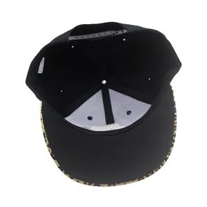 Inside view of black hip hop hat with flat brim featuring leopard pattern and adjustable strap