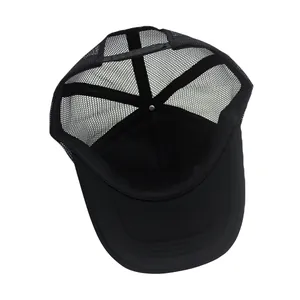 Detail view of the black trucker hat mesh and adjustable snapback closure for breathability