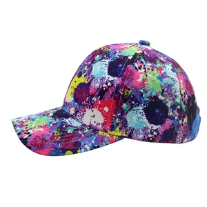 Close-up of colorful splash ink graffiti pattern on a cotton baseball cap surface