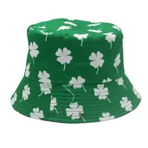 Close-up of vibrant green bucket hat with white clover print and high-quality fabric texture