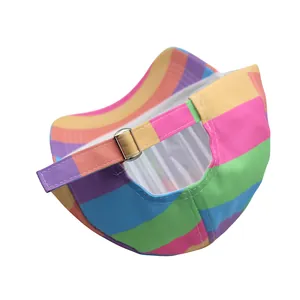 Detailed view of the metal adjustable buckle and rainbow striped fabric on a baseball cap