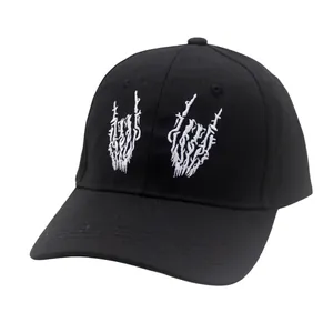 Black canvas baseball cap featuring white skull finger rock hand gesture embroidery