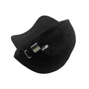 Detail of black cotton baseball cap showing adjustable silver metal buckle and back strap