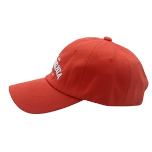 Detail of red cotton baseball cap with white California 3D embroidery and eyelets