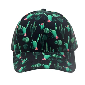 Close-up of a black baseball cap with vibrant green cactus and pink flower prints