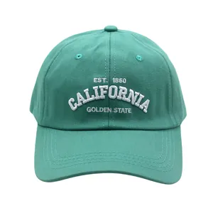 Close-up of mint green cotton baseball cap with white California 3D embroidery detail