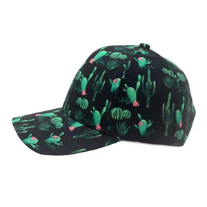 Black cotton baseball cap with green cactus and pink flower patterns in a side view