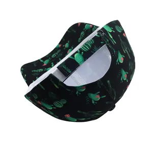 Detail view of black snapback hat with green cactus print and adjustable back strap