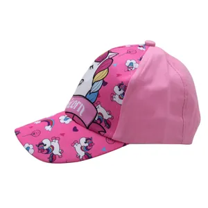 Pink kids baseball cap featuring colorful cartoon unicorn and rainbow prints