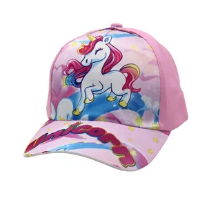 Close-up of pink unicorn baseball cap with cartoon print and glitter text detail