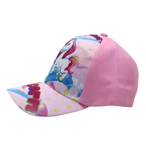 Detail of kids pink unicorn baseball cap showing colorful cartoon print and quality stitching
