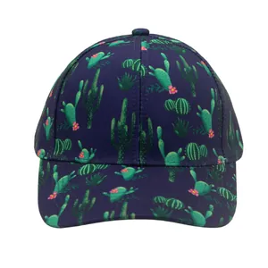 Detail of purple baseball cap featuring green cactus prints and pink floral accents
