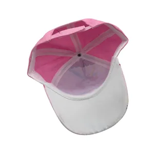 Internal view of pink kids baseball cap showing unicorn print and adjustable strap