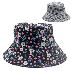 Detail of wide brim bucket hats featuring floral patterns and classic grey plaid designs