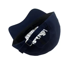 Detail view of navy baseball cap back showing adjustable metal buckle and inner lining