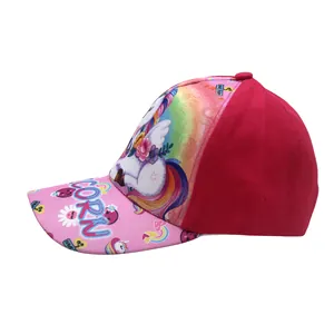 Side view of pink kids unicorn baseball cap with cartoon prints and CORN text design