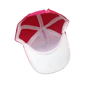 Internal view of a six-panel red kids baseball cap showing reinforced seams and stitching