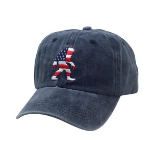 Washed navy cotton baseball cap with embroidered American flag Bigfoot patch