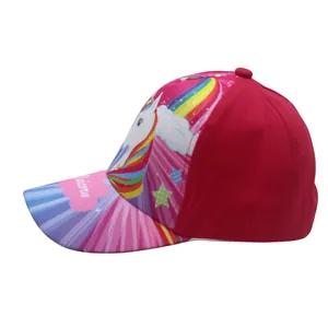 Close-up of pink unicorn baseball cap featuring colorful rainbow print and starry brim