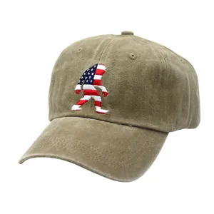 Detail of US flag Bigfoot embroidery on vintage washed cotton khaki baseball cap