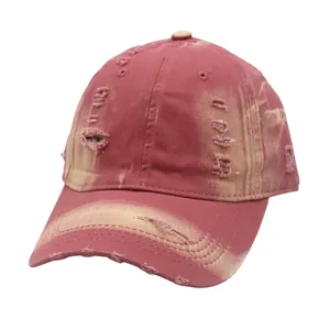 Distressed vintage dark red baseball cap with worn-out details and curved brim