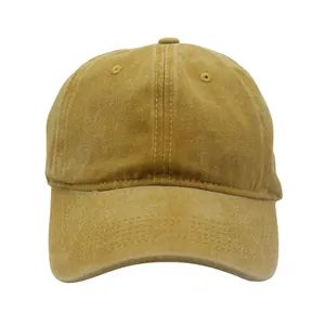 Close-up of the vintage washed cotton texture and reinforced stitching on the baseball cap