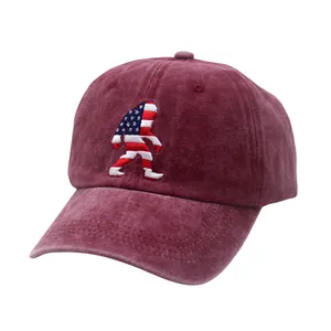 Close-up of embroidered Sasquatch design with USA flag pattern on washed cotton cap