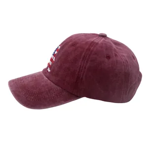 Detail of USA flag embroidery on burgundy washed cotton vintage baseball cap