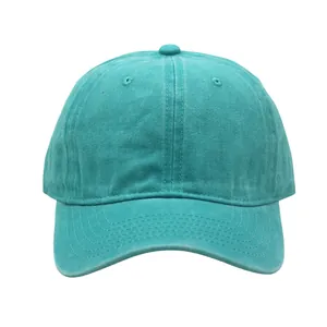 Detail view of teal washed cotton baseball cap showing six-panel stitch and eyelets
