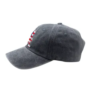Detail of grey washed cotton baseball cap with American flag sasquatch embroidery