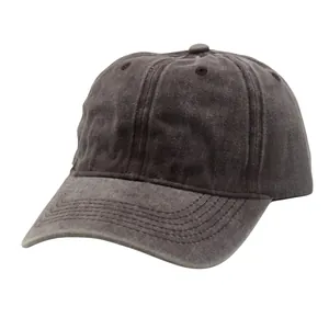 Detail of dark grey washed cotton baseball cap showing six-panel stitch and fabric texture