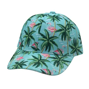 Detail of blue canvas baseball cap with pink flamingo and green palm tree prints