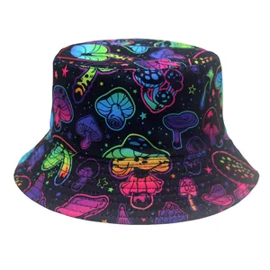 Detailed view of bucket hat featuring vibrant neon mushroom print on black twill fabric