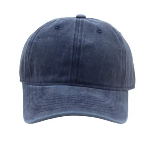 Front view of a plain washed navy cotton baseball cap with a curved brim and retro texture