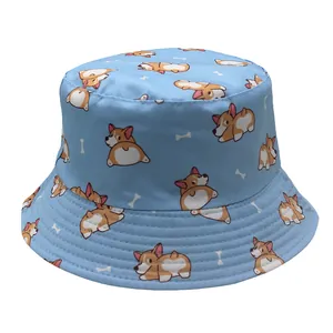 Close-up of light blue bucket hat featuring cute corgi and bone patterns with fine stitching