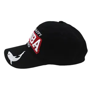 Detail of white shark embroidery and Aruba 3D lettering on a black cotton baseball cap