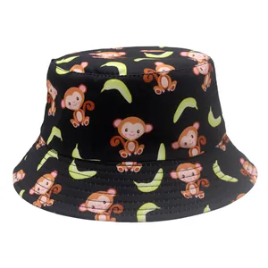 Detail of cartoon monkey and banana print on black bucket hat with reinforced brim stitching