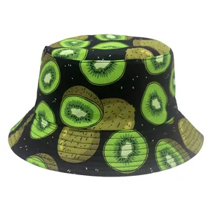 Detail of black bucket hat with vibrant green kiwi fruit print and durable fabric texture