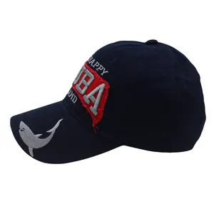 Detail of navy cotton baseball cap with Cuba embroidery and shark pattern on the side