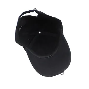 Close-up of the vintage distressed baseball cap interior with cotton wash label and metal buckle