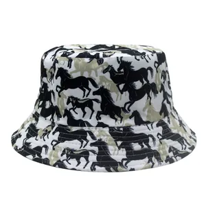 Close-up of white bucket hat featuring running black and khaki horse prints in detail
