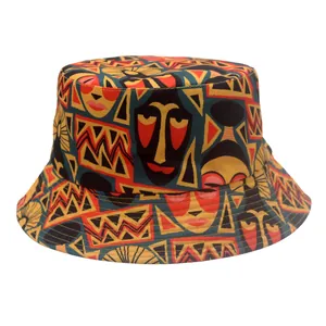 Detailed close-up of tribal pattern bucket hat featuring bold African abstract face prints