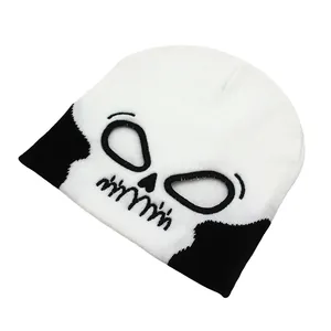 Knitted beanie hat with black skull pattern for Halloween outdoor winter warmth