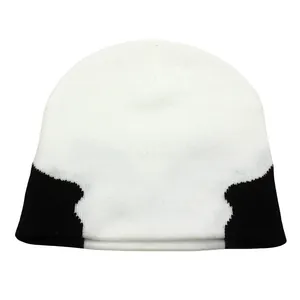 White knitted beanie with black geometric pattern for outdoor warmth in autumn and winter