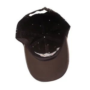 Internal structure of brown washed cotton baseball cap with sweatband and stitching details