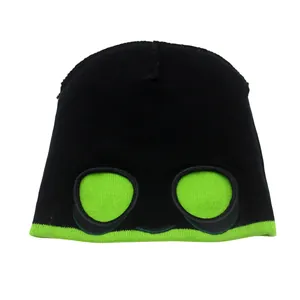Bonnet en tricot noir rigolo pour enfants avec yeux d'alien verts et bordure contrastée