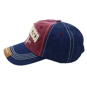 Detail of vintage washed baseball cap featuring 3D embroidery and contrast stitching