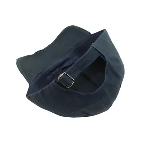 Detail of adjustable metal buckle and navy cotton strap on the vintage baseball cap