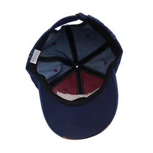 Detail view of cotton baseball cap interior showing reinforced seams and fabric label